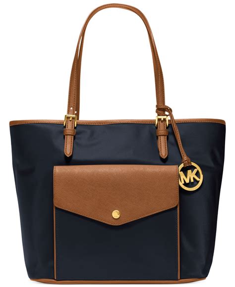 michael kors black & white with gold purse|Michael Kors black nylon tote.